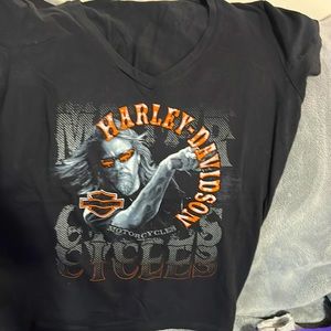 Woman’s Harley Davidson, V-neck T-shirt, man on front orange lettering